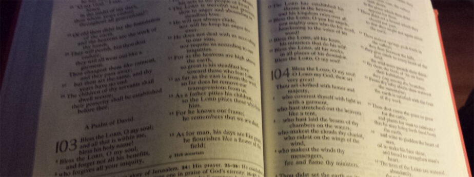 open Bible on Psalm 103, 104